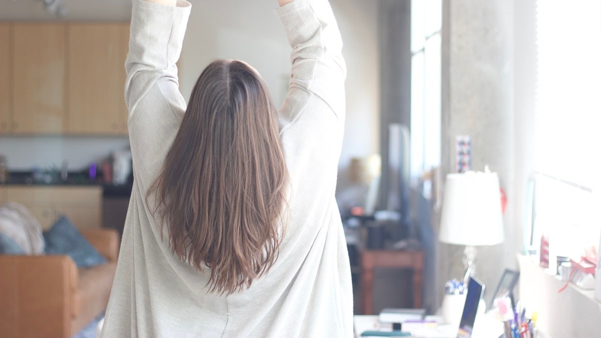 woman in white long sleeve shirt